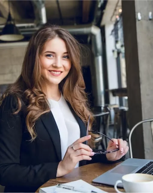 A professional working at a laptop